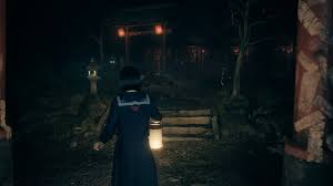 Hinako exploring dark shrine with lantern in Silent Hill f